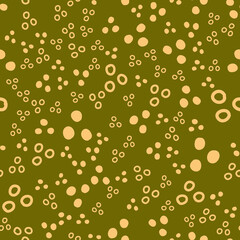 Abstract specks on a green marsh background, seamless pattern for textile and packaging design. Vector illustration
