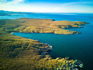 Panorama view from a height of a beach with a forest near the Black Sea in the country of Bulgaria