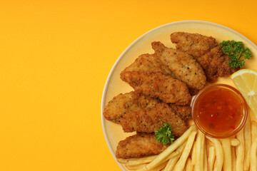 Concept of tasty food with chicken strips, space for text