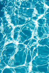 Blue ripped water in swimming pool, water pool texture and surface water backgraund.