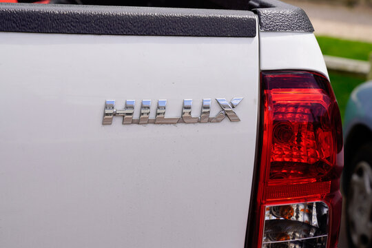 Toyota Hilux Logo Text And Sign Brand Detail Silver White Car Pickup