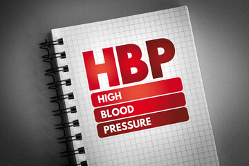 HBP - High Blood Pressure acronym on notepad, health concept background