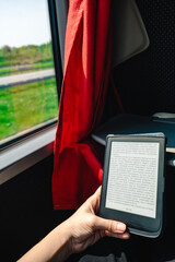 reading book in bus