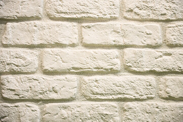 Empty light brick wall. Background for a design project. Stone wall brick texture
