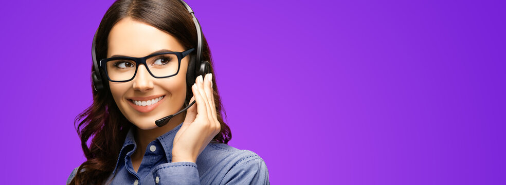 Contact Call Center Service. Customer support, sales agent. Caller answering phone operator or businesswoman in headset. Portrait of brunette woman in glasses spectacles. Violet purple background.