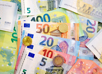 Euro banknotes and coins. Money background