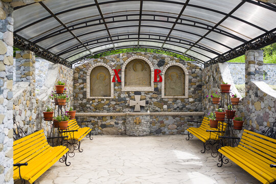 Alagir , North Ossetia-Alania , Russia - May 12 , 2022 : Epiphany Alan Monastery , water from small wall  fountain