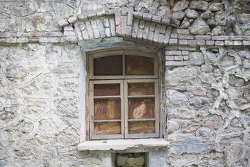 Fototapeta na wymiar window of an abandoned building . close up view