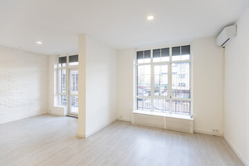 Fototapeta premium Modern empty elegant office with windows and workplaces.