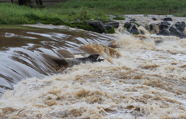 Overflowing weir during Queensland floods