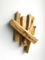 Set of wooden palo santo aroma sticks, natural incense top view, place for text