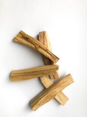 Set of wooden palo santo aroma sticks, natural incense top view, place for text