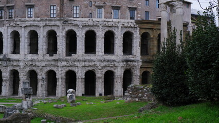 Obraz premium View of many stones and ruins before Temple of Apollo Medicus Sosianus and Teatro Marcello