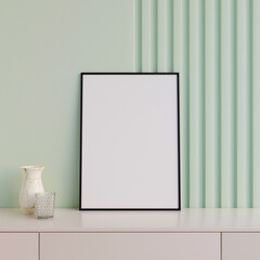 Modern and minimalist vertical black poster or photo frame mockup on the table in the living room. 3d rendering.