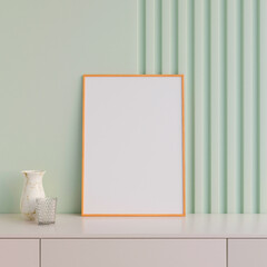 Modern and minimalist vertical wooden poster or photo frame mockup on the table in the living room. 3d rendering.