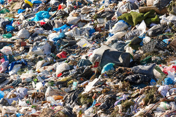 Open air garbage dump. Plastic waste pollution. Global warming. Climate