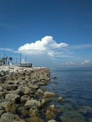 beautiful beach with coral at summertime, centre point makassar, south sulawesi, indonesia