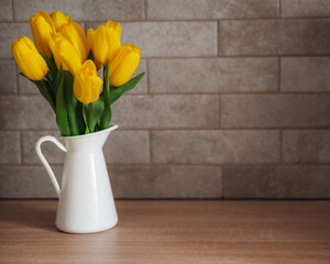 Beautiful tulip flowers  on table at kitchen
