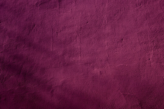 Crimson colored wall background with textures of different shades of crimson red