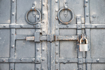 Fototapeta na wymiar closed metal door with lock