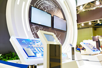 Electronic digital booths at industrial exhibition - obrazy, fototapety, plakaty