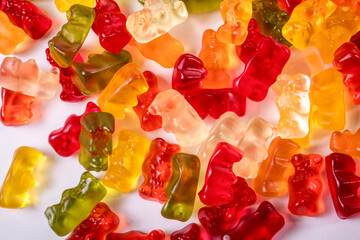 Stack of rubber bears on a white background