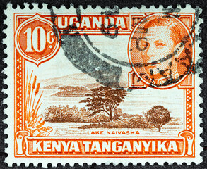 KENYA, UGANDA AND TANGANYIKA - CIRCA 19638 post stamp printed in Kenya, Uganda, Tanganyika shows...