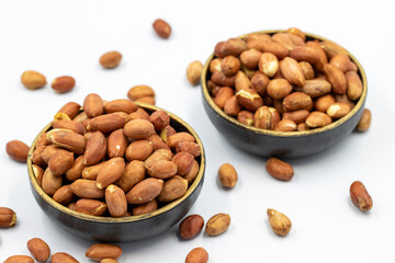 Peanuts on a white background. Healthy and fresh.nuts. Close-up.