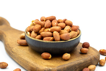 Peanuts on a white background. Healthy and fresh.nuts. Close-up.