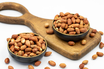 Peanuts on a white background. Healthy and fresh.nuts. Close-up.
