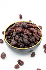 Dried blueberry on a white background. Healthy and fresh.nuts. Close-up.