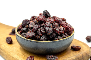 Dried blueberry on a white background. Healthy and fresh.nuts. Close-up.