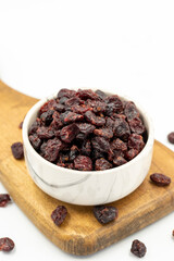 Dried blueberry on a white background. Healthy and fresh.nuts. Close-up.