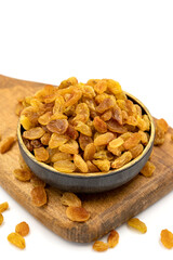 Dried raisins on a white background. Healthy and fresh.nuts. Close-up.