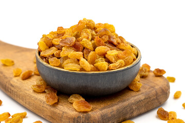 Dried raisins on a white background. Healthy and fresh.nuts. Close-up.