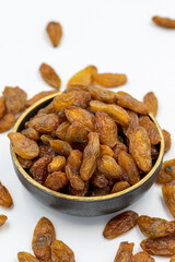 Dried raisins on a white background. Raw grapes and raisins. Healthy and fresh nuts. close-up. Local name besni uzum