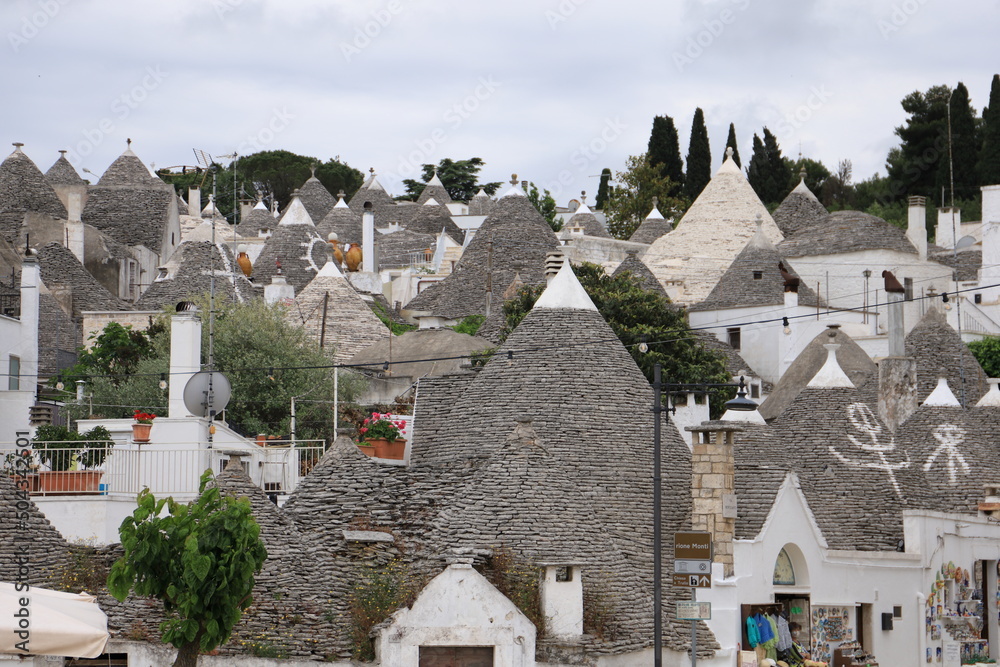 Poster Panoramic view of Alberobello with Trulli houses, Italy