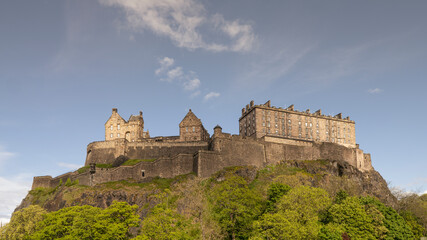 Fototapeta premium View of Edinburgh Castle from low angle in city against sky, Edinburgh, Scotland, Britain, uk.