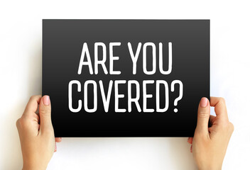 Are You Covered Question text on card, concept background