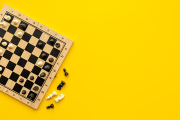 Chess pieces battle on chessboard. Teamwork concept