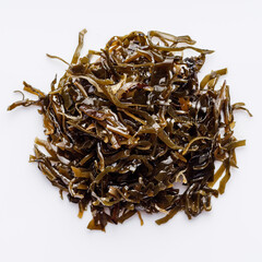 seaweed salad on a white acrylic background