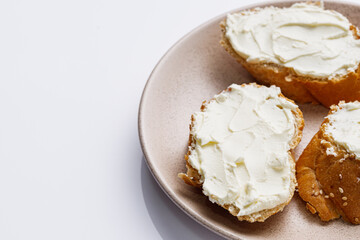 baguette cream cheese sandwich on a white background