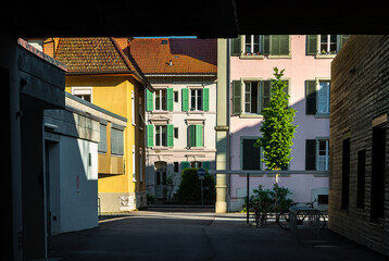 Biel, Switzerland - Mai 11, 2022: View of the courtyard of a residential housing area with old traditional houses in Biel
