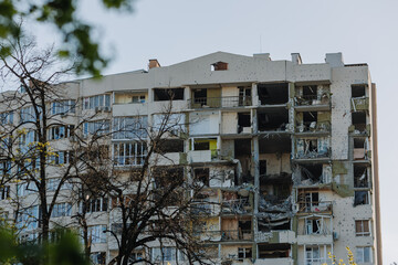 Chernihiv Ukraine 2022: A destroyed building after air attack. Result of rocket or artillery shelling residential buildings by Russian Federation army.Ruins during War of Russia against Ukraine. - obrazy, fototapety, plakaty