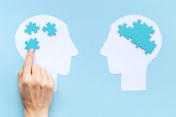 Social communication and connection concept with two paper human heads