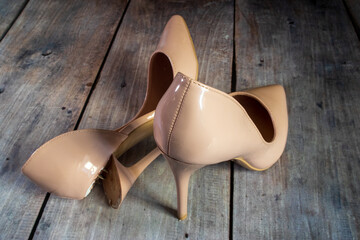 Beige shoes with a broken heel