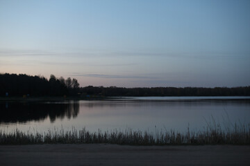 sunset at coast of the lake. Nature landscape. Landscape during sunset.