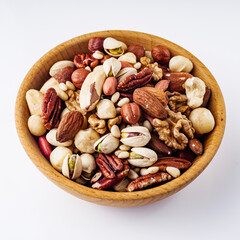 set of different nuts on a white acrylic background