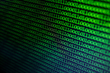 Binary Code Background. Technology abstract green background, green binary code on computer screen texture background. An image of a binary code made up of a set of green digits on a black background
