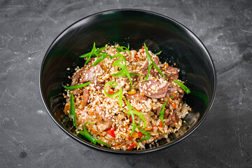 traditional chinese fried rice on black background